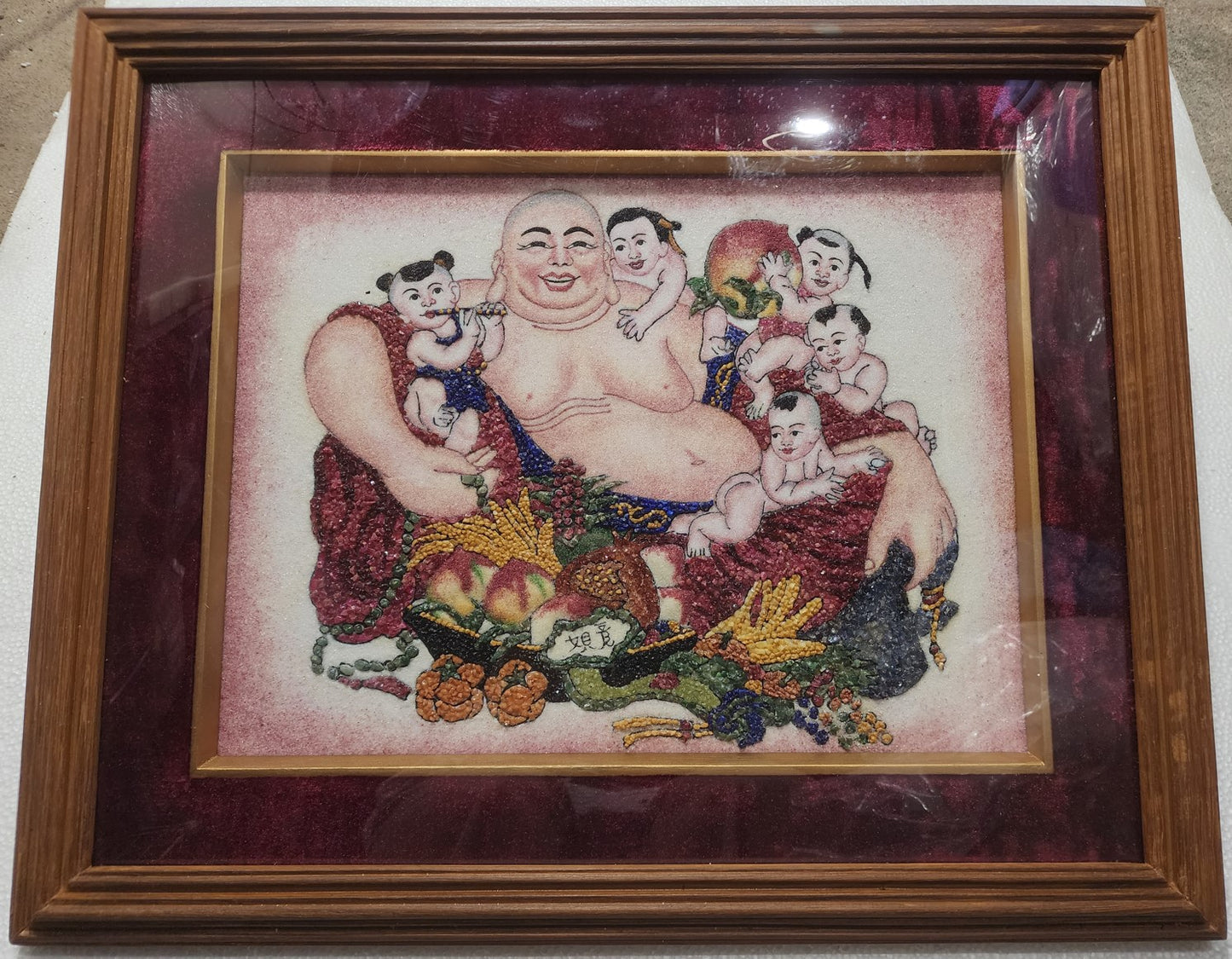 Budai (a symbol of abundance or forgiveness)